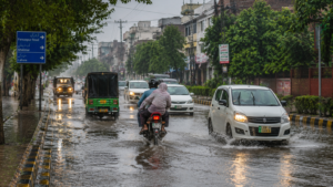 Pakistan monsoon rains waterlogged road in Lahore